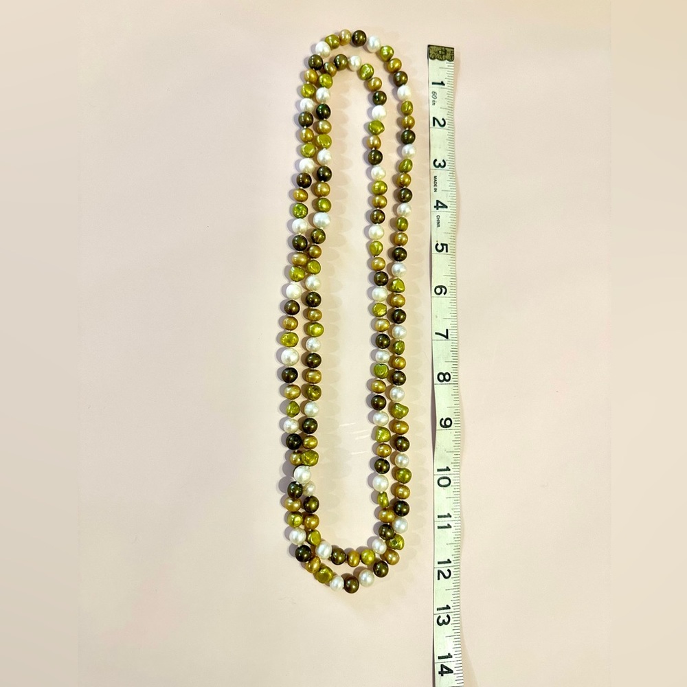Good quality gold/green/pearl long necklace. Can be used long or as 2 strands.